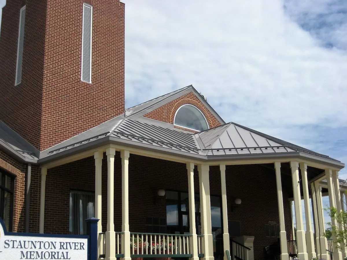 Skilled roofing craftsmen working on a residential roof in Valdosta
